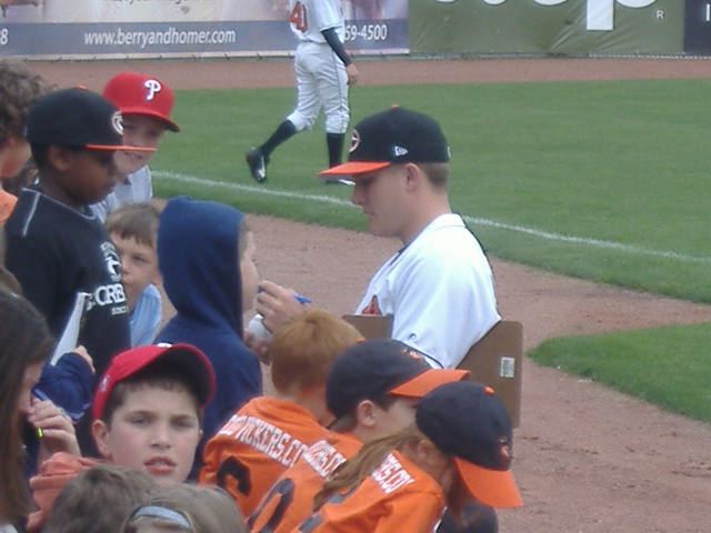 Cole McCurry has a lot of fans on this day as he signs autographs.